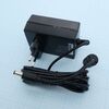 GS18E18-P1J, ac-dc, 18вт, вход 90...264b ac 47...63 гц, 135...370b dc, выход 18в/1a, изоляция 4242b ac, настенный 79x54x33мм, 0...+50°с, двухполюсная евровилка, выходной разъем 11мм, диам. 5.5х2.1мм